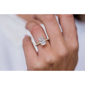 ROWAN 3 Carat (10x6.5mm) Elongated Crushed Ice Radiant Moissanite Engagement Ring with Invisible Halo in 18k Yellow Gold
