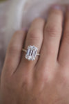 SUTTON 8 Carat (13x9.5mm) Elongated Emerald Cut Moissanite Engagement Ring with NSEW Prongs and Micropave Setting in Two-Tone Setting