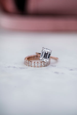 CELINE HALF ETERNITY (4x2.5mm) Emerald Cut Moissanite Eternity Wedding Band in 14K Rose Gold With Claw Prongs